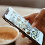 selective focus photography of person using iphone x